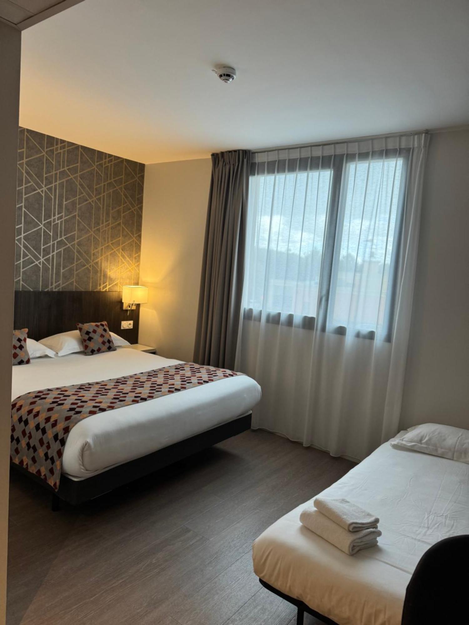Brit Hotel Ploermel - Hotel De L'Hippodrome Экстерьер фото